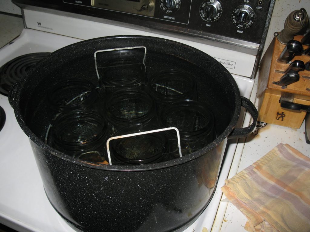 Boiling jars in canner