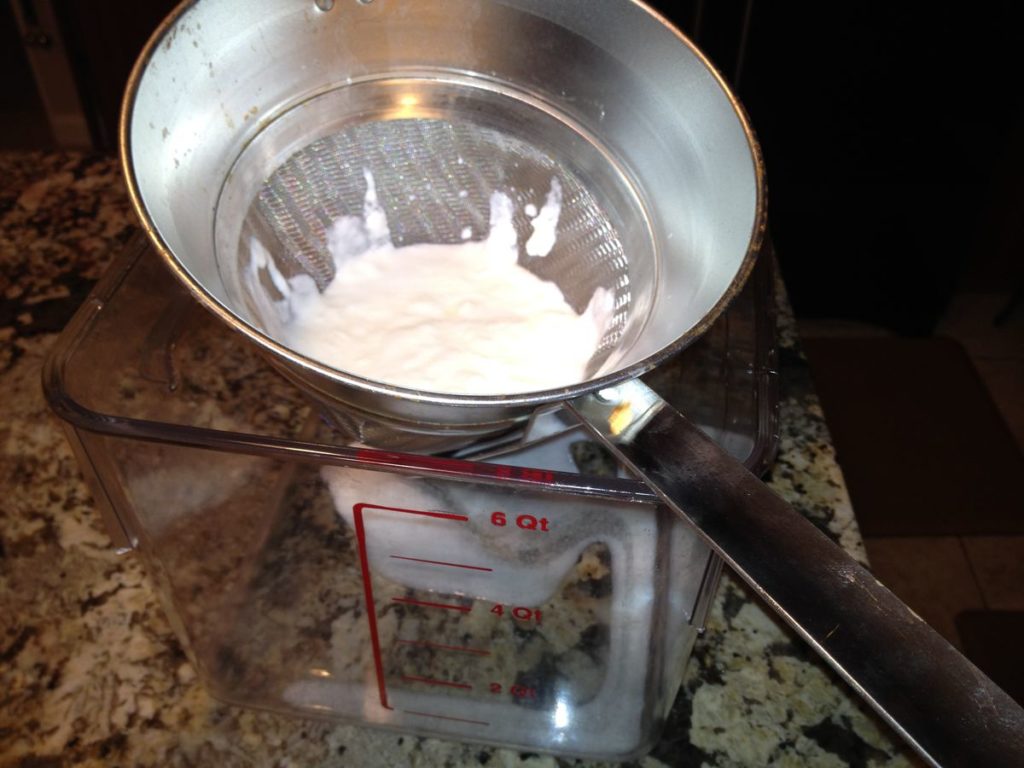 Straining Yogurt to make Greek Style